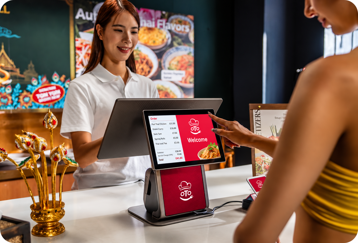 An OTO-branded counter terminal showing a customer's order and total, with a card payment device beside it on the counter